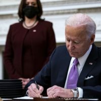 getty_12221_bidensigningeos
