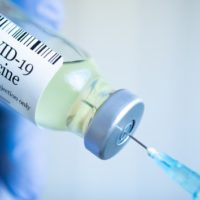 istock_12621_covidvaccsyringe