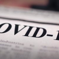 istock_12821_covid19newspaper
