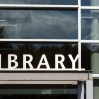 closeup-of-the-library-sign-at-the-entrance-to-a-modern-public-l