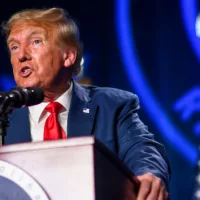 getty_81723_trumpspeakingpodium777763