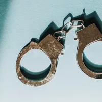 gettyimages_handcuffs_092523745075