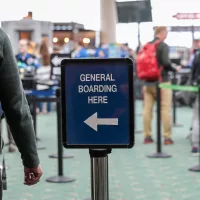 posted-sign-in-an-airport-read-general-boarding-here-to-direct-passenger-for-tsa-security-check