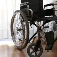 wheelchairs-to-disabled-people-in-a-bedroom