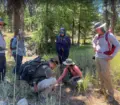 volunteers-observing-and-interpreting-track-and-sign-during-a-summer-outing-in-the-ochocos