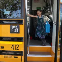 student-tours-school-bus-at-on-the-road-to-kindergarten