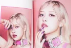 BlackPink BORN PINK 2nd Album photobook with Rose on grey. Pink music CD in player. South Korean girl group BlackPink. Space for text. Gatineau^ QC Canada - November 10 2022.