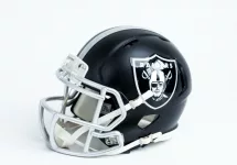 Las Vegas Raiders NFL team helmet on white background.