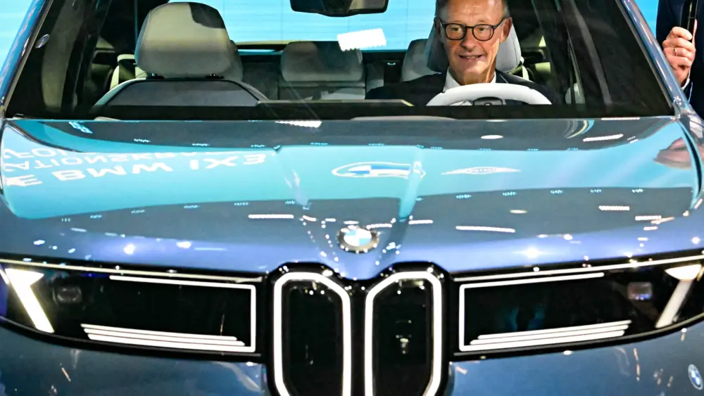 german-chancellor-friedrich-merz-is-seated-in-bmw-ix3-car-news-photo-1764799352pjpeg