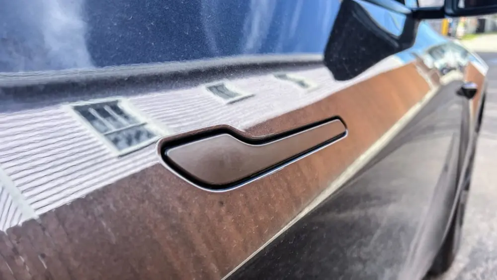 tesla-door-handle-repair-tims-quality-car-care-new-orleans-70119-scaled-1164416204964533