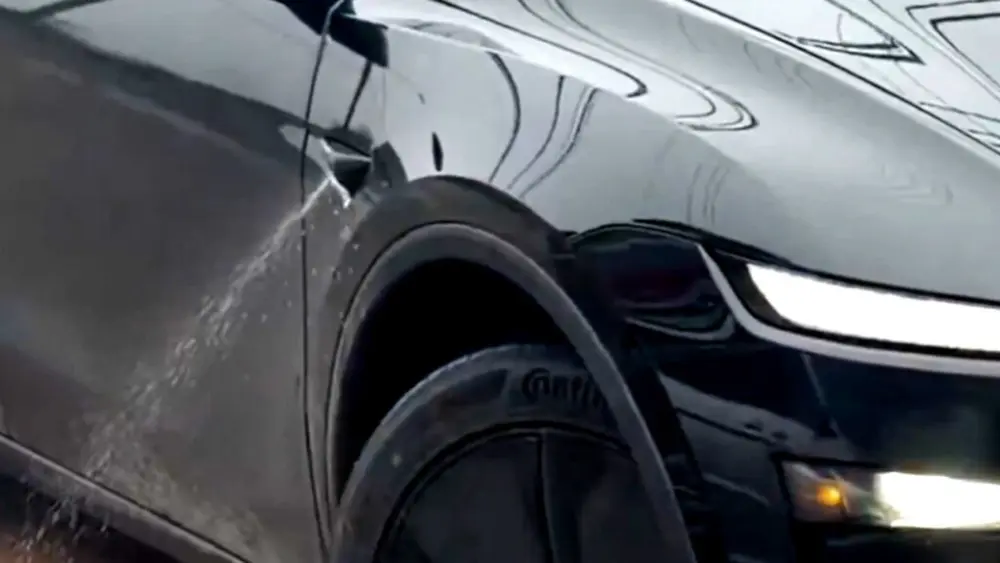 tesla-robotaxi-camera-washer-copy-1024x576359372-1