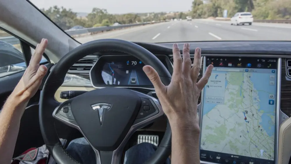a-member-of-the-media-test-drives-a-tesla-model-s-equipped-with-autopilot-in-palo-alto-california-us-on-wednesday-oct-14-2015359696