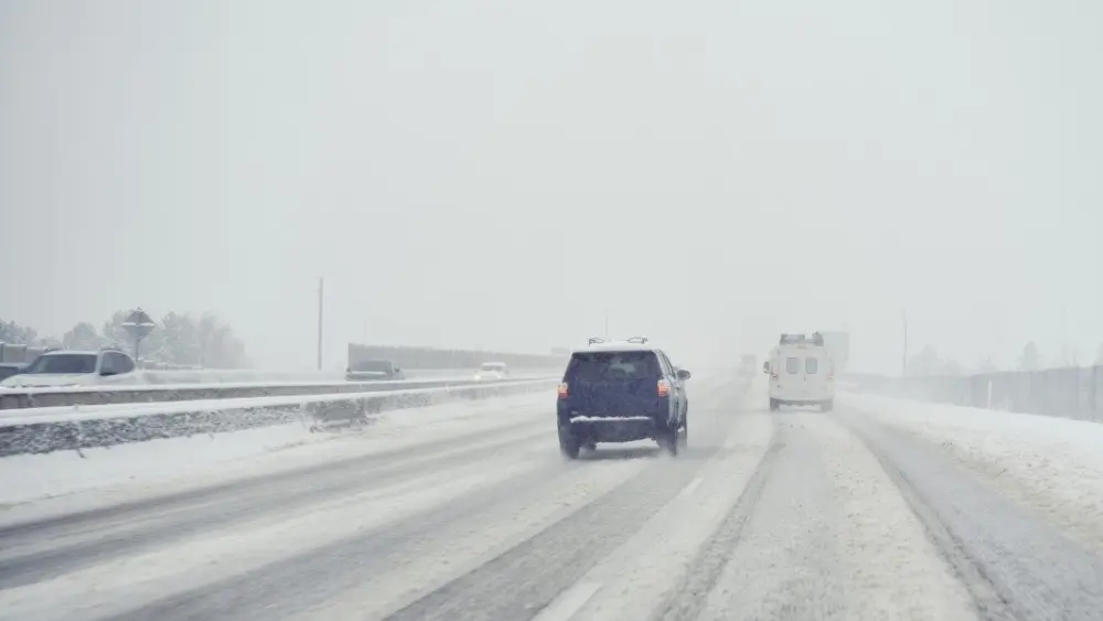driving-a-car-in-a-winter-snowstorm383287