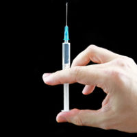 syringe-in-hand-injection