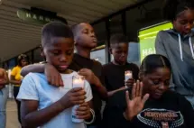 getty_candlelitvigiljohnsonfamily_042126_0365728