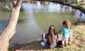 family-fishing-in-park