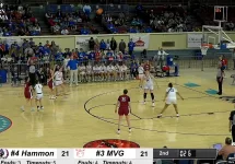 female basketball players compete fiercely during the Hammon vs. Mountain View-Gotebo girls' basketball game at the state playoffs, as seen in a screenshot from ParagonTV.com.