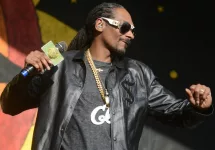 Snoop Dogg performs at the 2017 New Orleans Jazz and Heritage Festival. New Orleans^ Louisiana - May 6^ 2017