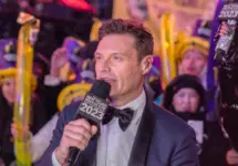 Ryan Seacrest is seen in Times Square during a New Year's Eve broadcast. NEW YORK^ N.Y. – December 31^ 2022