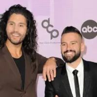 Dan Smyers and Shay Mooney of Dan + Shay at the 2022 American Music Awards held at the Microsoft Theater in Los Angeles^ USA on November 20^ 2022.
