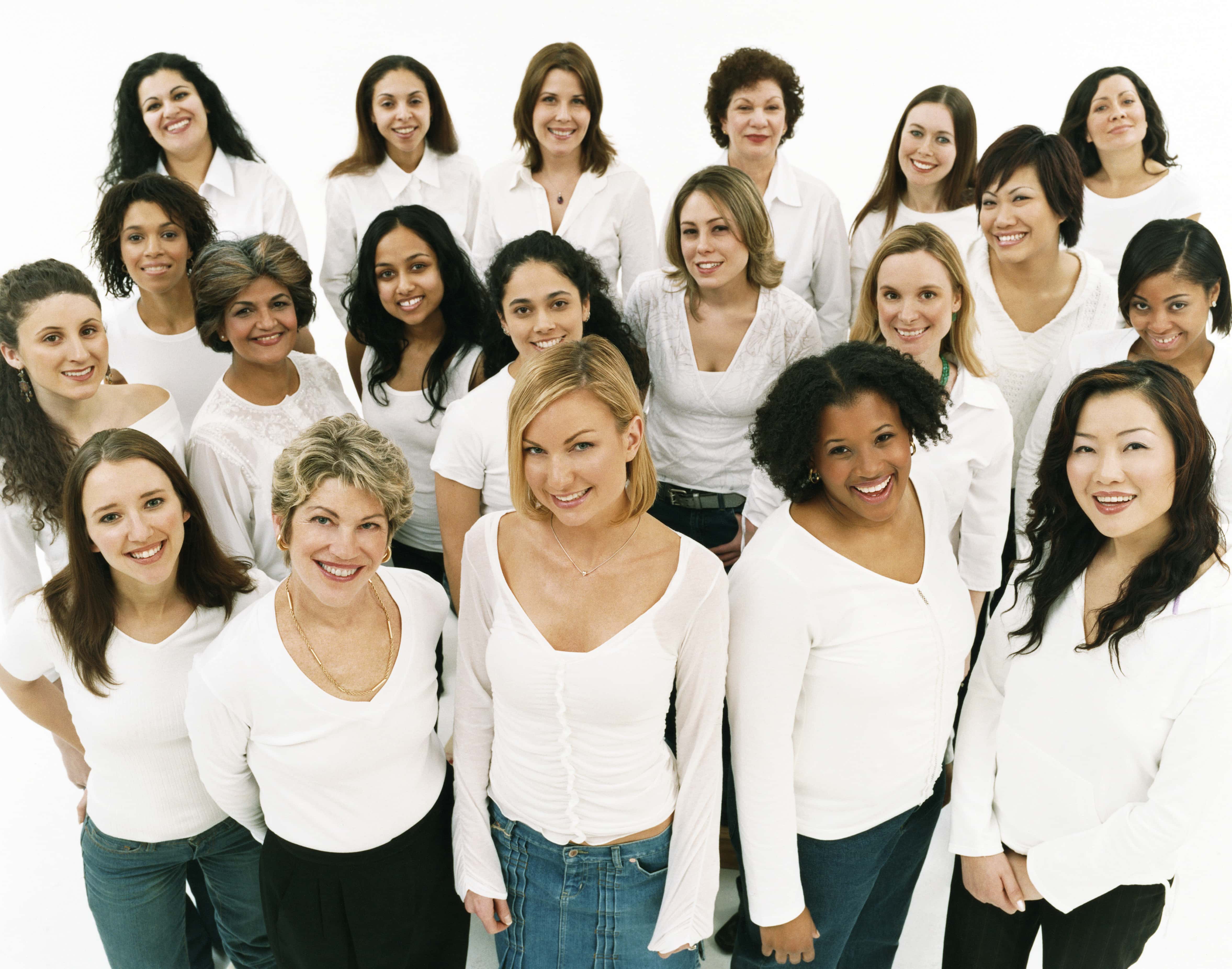 studio-portrait-of-a-mixed-age-multiethnic-large-group-of-happy-women-wearing-white-tops