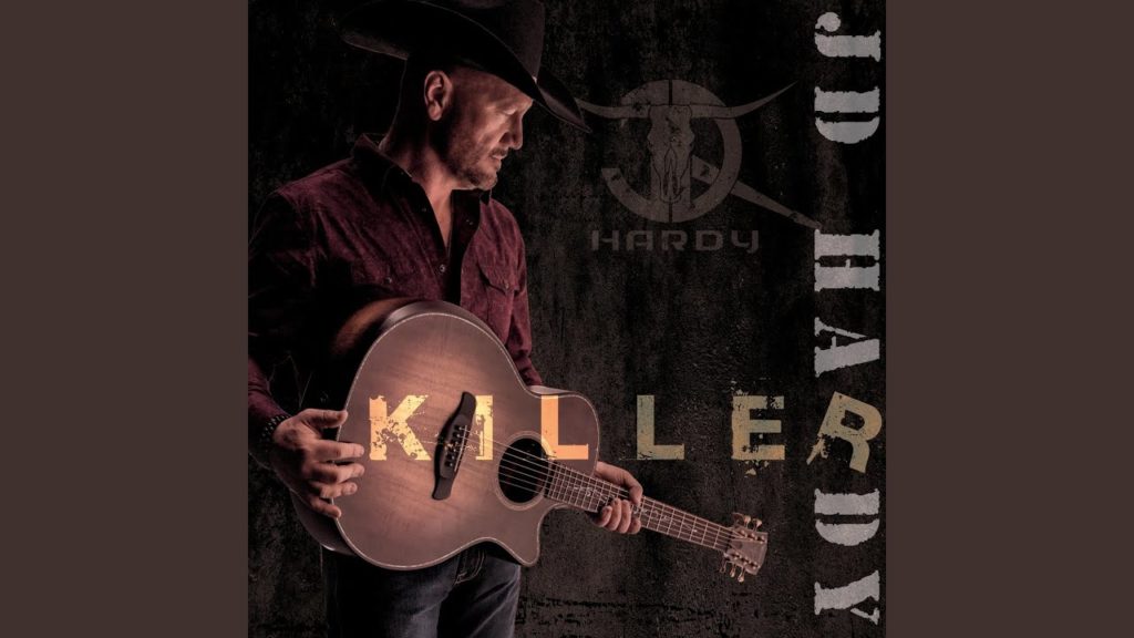 New at Noon – JD Hardy "It's That Time Again" - Vimarsana News