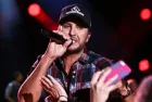 Luke Bryan performs at Nissan Stadium during the 2017 CMA Festival on June 8^ 2017 in Nashville^ Tennessee.