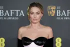 Margot Robbie attends the 2024 EE BAFTA Film Awards at The Royal Festival Hall in London^ England. London^ United Kingdom - February 18^ 2024