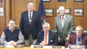 The newly seated Board of Commissioners took time for a photo, prior to their meeting Tuesday.