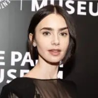 Lily Collins wearing dress and shoes by Versace attends PaleyLive program: Emily in Paris: The Magic Behind the Scenes at Paley Center for MEdia in New York on September 17^ 2024