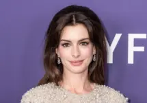Anne Hathaway wearing dress and shoes by Valentino attends presentation of movie Armageddon Time during 60th New York Film Festival at Alice Tully Hall on October 12^ 2022