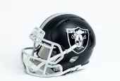 Las Vegas Raiders NFL team helmet on white background.