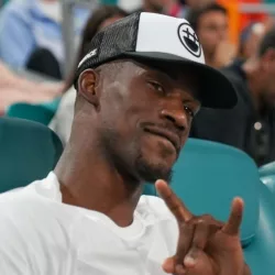 Jimmy Butler^ an American professional basketball player for the Miami Heat^ attends the semifinal match at 2023 Miami Open at the Hard Rock Stadium in Miami MIAMI GARDENS^ FLORIDA - MARCH 31^ 2023