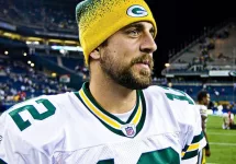 Quarterback Aaron Rodgers walks on Qwest Field after winning a football game August 21^ 2010 in Seattle^ Washington.