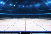 Grand ice hockey rink and illuminated indoor arena with fans^ tribune side view^ professional hockey sport 3D render illustration background