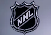 National Hockey League. Logo of NHL club on the screen.
