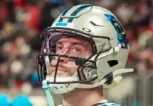 Carolina Panthers wide receiver Adam Thielen (19) on the sidelines against the Atlanta Falcons on January 5^ 2025 at Mercedes-Benz Stadium.