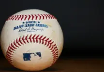 Major League Baseball (MLB) Baseball on black background
