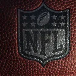Closeup of an NFL logo on an American football