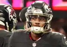 Atlanta Falcons quarterbacks Michael Penix Jr (9) before the game against the Carolina Panthers on January 5^ 2025 at Mercedes-Benz Stadium.