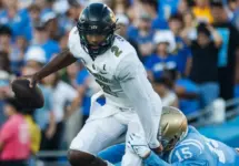 Colorado quarterback Shedeur Sanders #2 is tackled by UCLA defensive line Laiatu Latu #15 during an NCAA college football game between the UCLA and the Colorado^ Oct. 28^ 2023^ in Pasadena^ Calif.