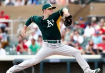 Oakland Athletics starting pitcher Sonny Gray (54) pitches against the Arizona Diamondbacks at Salt River Fields at Talking Stick on March 6^ 2014 in Scottsdale^ Arizona.