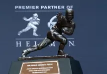 New York^ NY - December 14^ 2019: Heisman Memorial Trophy trophy on display at the Marriott Marquis Hotel