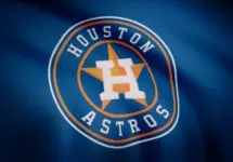 Waving flag with Houston Astros professional team logo. Close-up of waving flag with Houston Astros baseball team logo^ seamless loop
