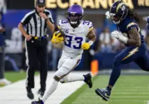 Minnesota Vikings running back Aaron Jones in runs against the Los Angeles Chargers during an NFL football game Oct. 23^ 2025^ in Inglewood^ Calif.