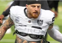 Las Vegas Raiders defense end Maxx Crosby #98 warms up prior to an NFL football game against the Los Angeles Rams at SoFi Stadium^ Oct. 20^ 2024^ in Inglewood^ Calif.