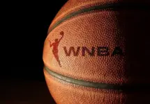 Closeup of a basketball with the WNBA logo and text Raleigh^ NC - USA - 06-13-2024