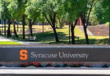 Close-up view of Syracuse University signage. Syracuse University is a private research institution located in Syracuse^ New York. Founded in 1870 Syracuse^ NY - Aug 18^ 2025