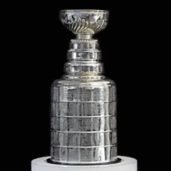 NHL ceremony - Stanley Cup trophy on the white stand^ black background^ Vancouver BC - October 22^ 2018