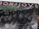 Bon Jovi music album on vinyl record LP disc. 'Slippery When Wet'